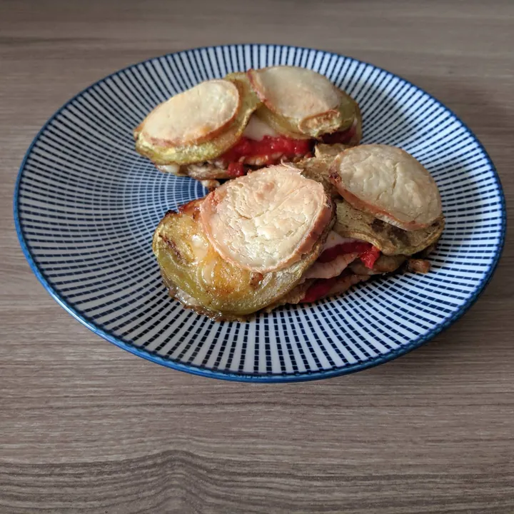 Milhojas de lomo, berenjena y queso