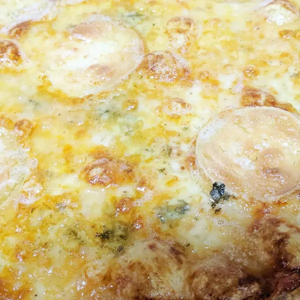 Five-cheese pizza with a three-flour dough