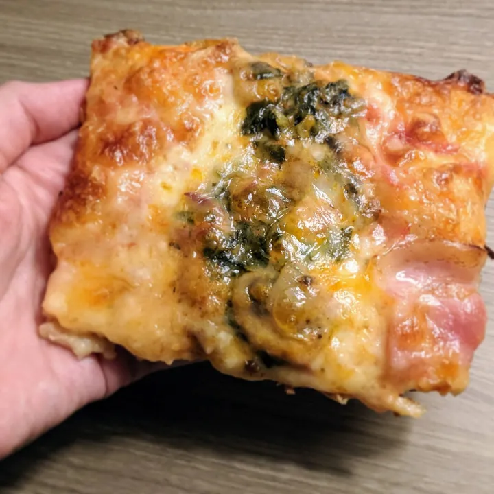 Leftover lasagne filling pizza